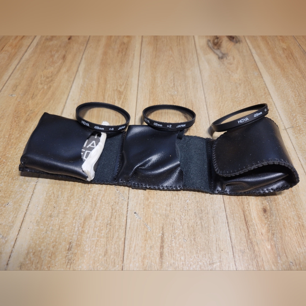 Hoya 49mm camera lens filters set of 3 with case.